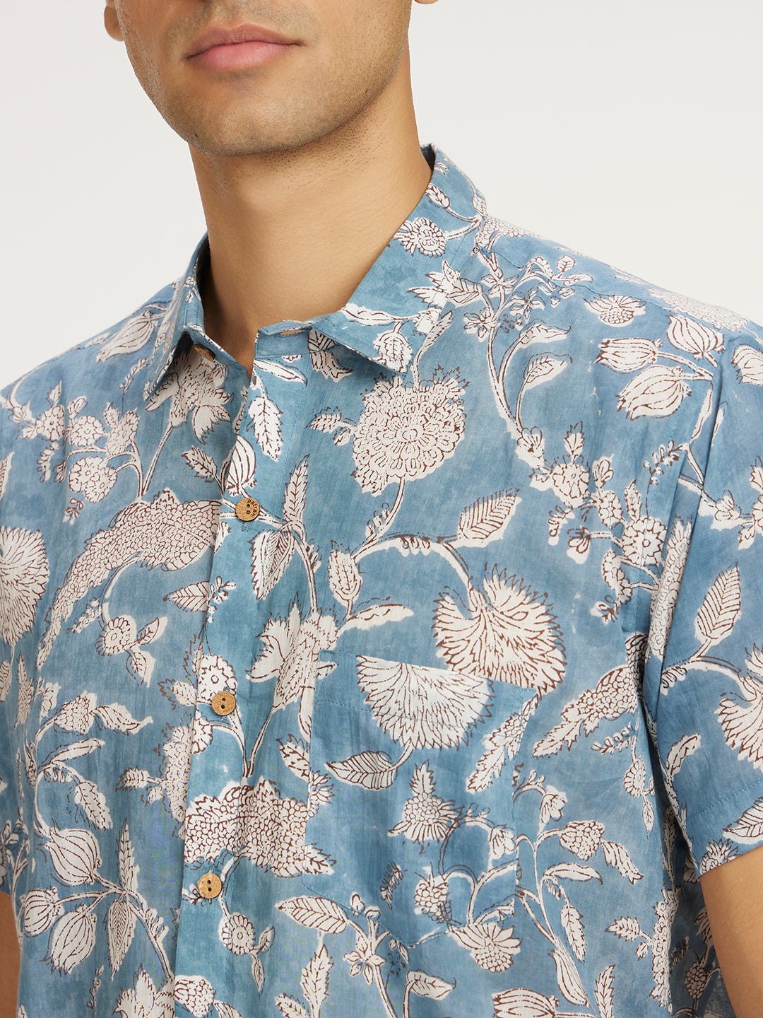 Close up of Blue Floral Block Printed Holiday Halfsleeves Mulmul Cotton Shirt by Brand Patrah
