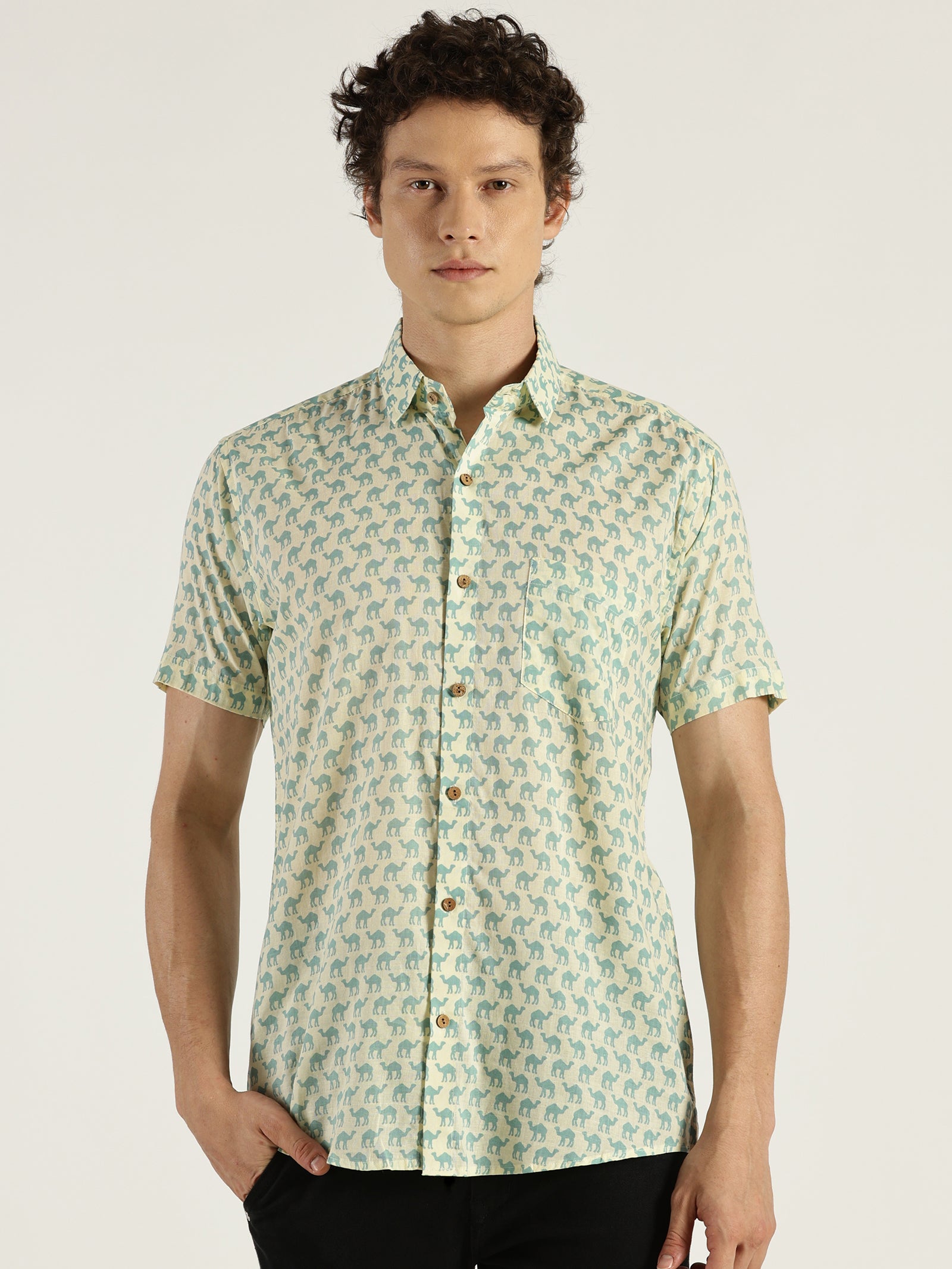 White Model wearing Light Blue Camel Printed Halfsleeves Cotton Shirt by Brand Patrah