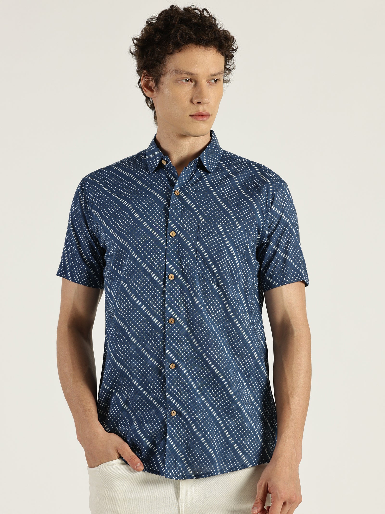 White Model wearing Blue Abstract Chex Printed Halfsleeves Cotton Shirt by Brand Patrah