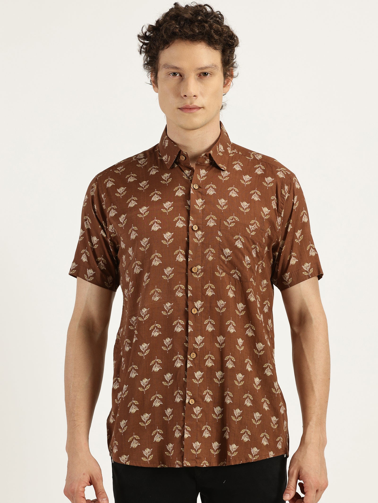 White Model wearing Earthy Brown Floral Printed Halfsleeves Cotton Shirt by Brand Patrah