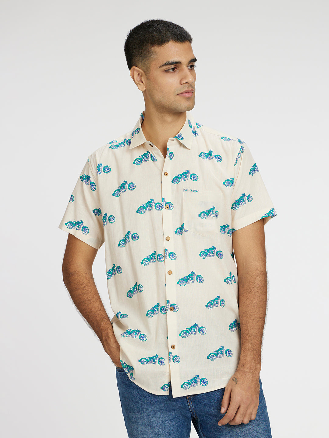 Model Facing sideways wearing Blue Bike Printed Halfsleeves Cotton Shirt by Brand Patrah