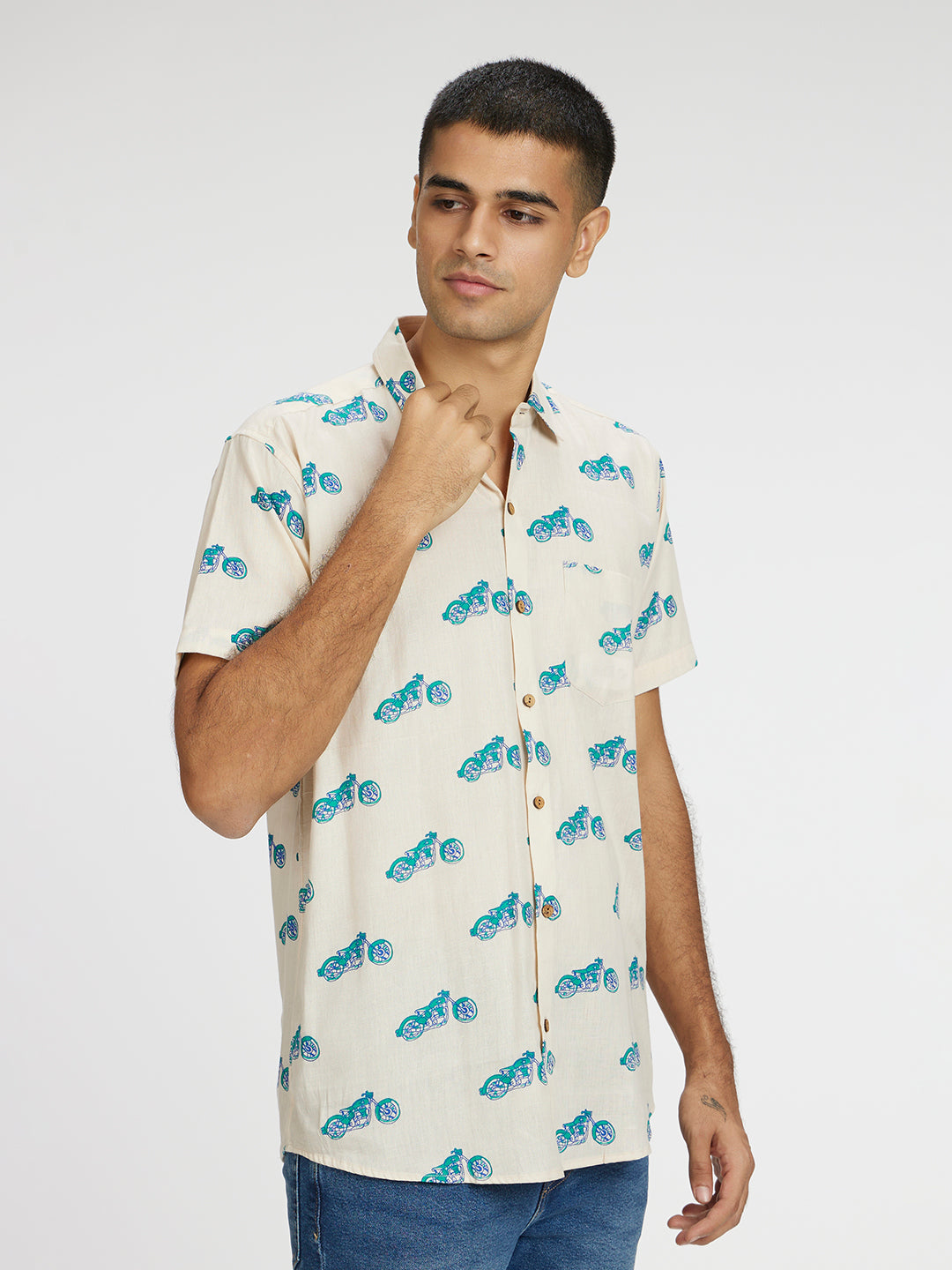 Model Facing sideways wearing Blue Bike Printed Halfsleeves Cotton Shirt by Brand Patrah