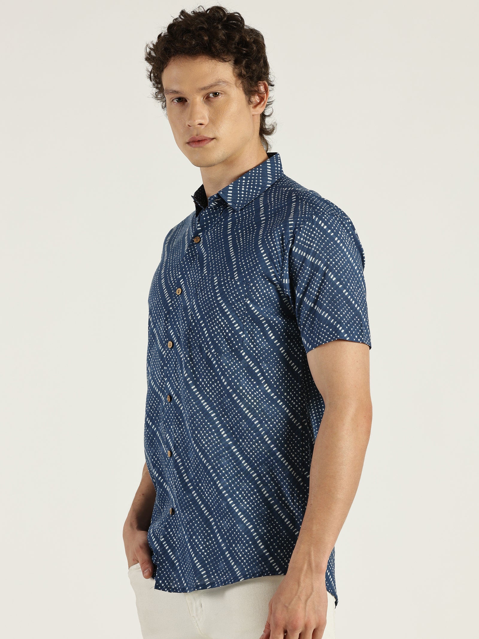 White Model wearing Blue Abstract Chex Printed Halfsleeves Cotton Shirt by Brand Patrah