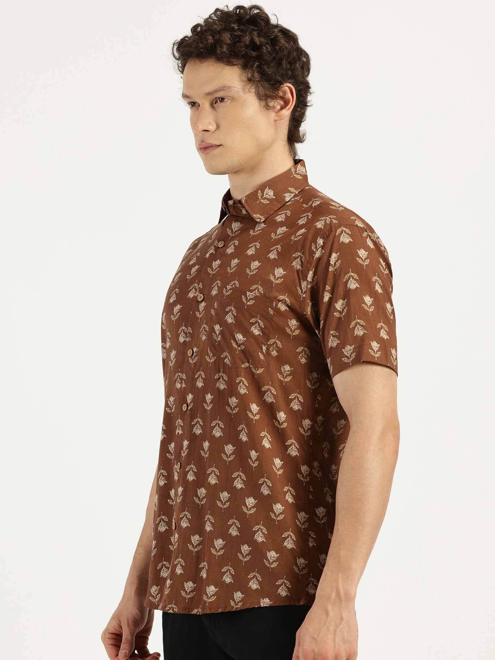 White Model wearing Earthy Brown Floral Printed Halfsleeves Cotton Shirt by Brand Patrah