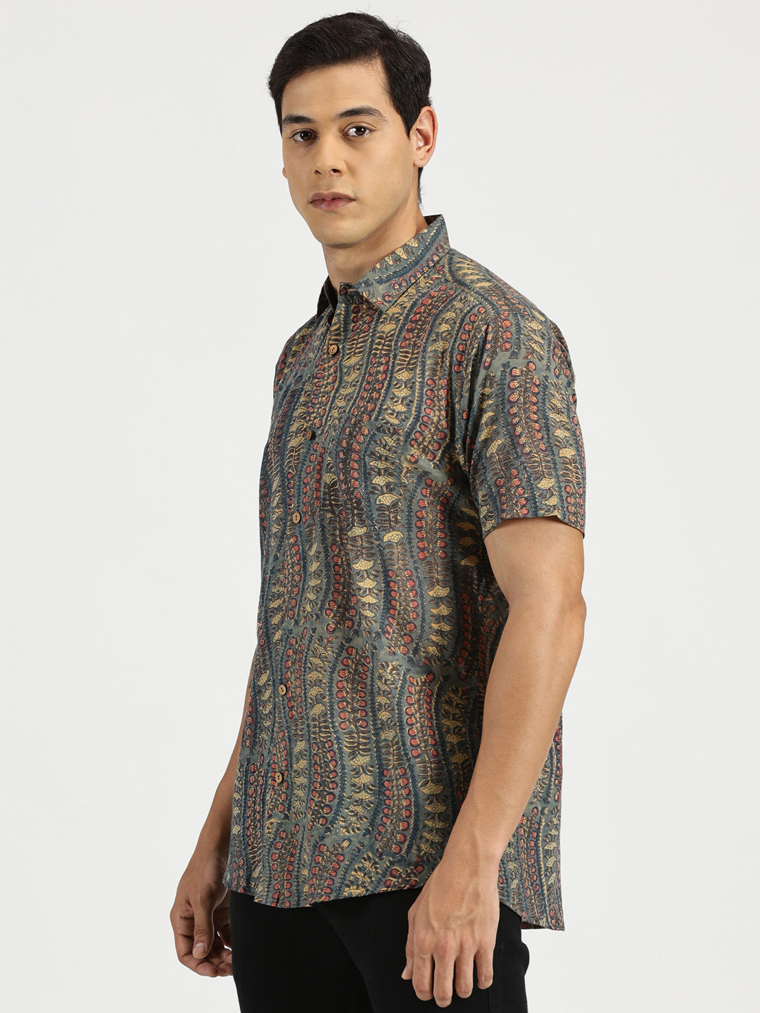 White Model wearing Emerald Nomad Block Printed Halfsleeves Mulmul Cotton Shirt by Brand Patrah