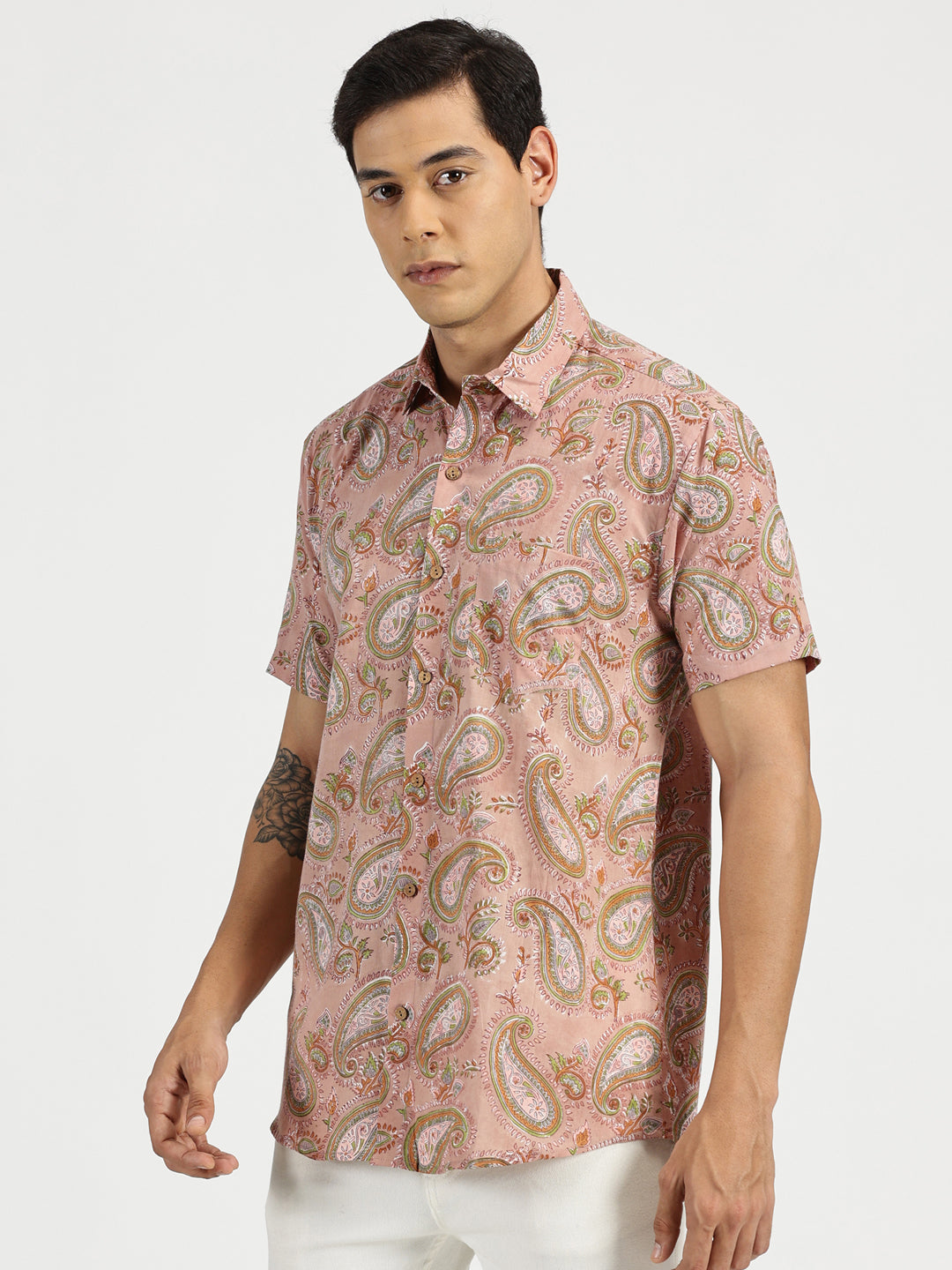 White Model wearing Pink Paisley Ethnic Block Printed Halfsleeves Cotton Shirt by Brand Patrah