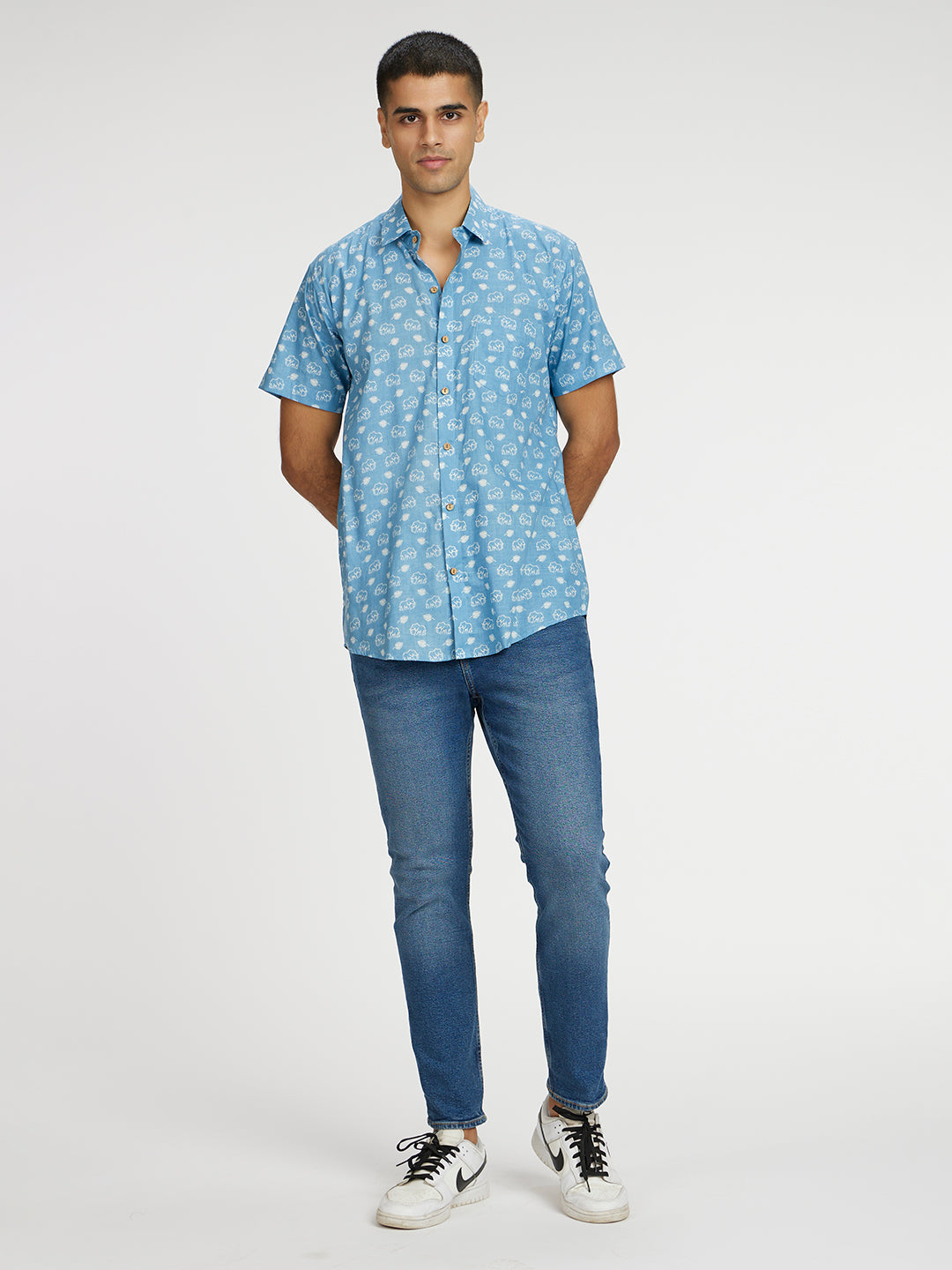 Brown Model wearing Blue skies white elephant printed Halfsleeves Cotton Shirt by Brand Patrah