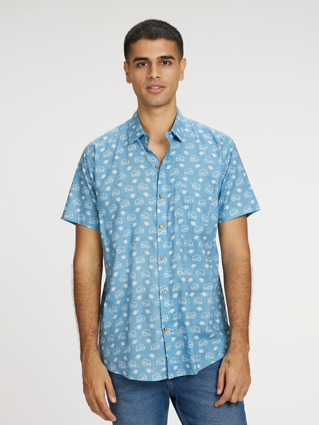 Brown Model wearing Blue skies white elephant printed Halfsleeves Cotton Shirt by Brand Patrah