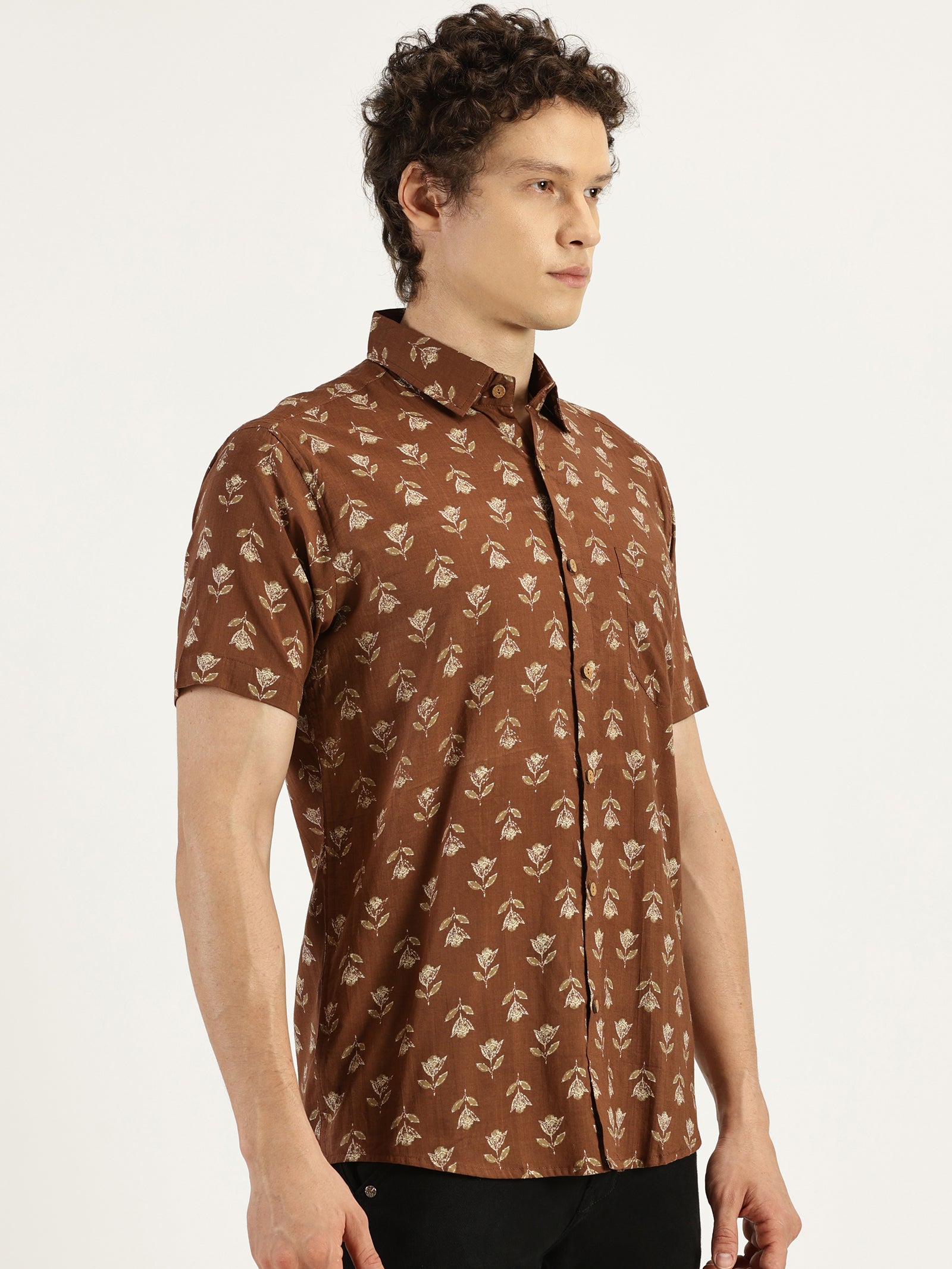 White Model wearing Earthy Brown Floral Printed Halfsleeves Cotton Shirt by Brand Patrah
