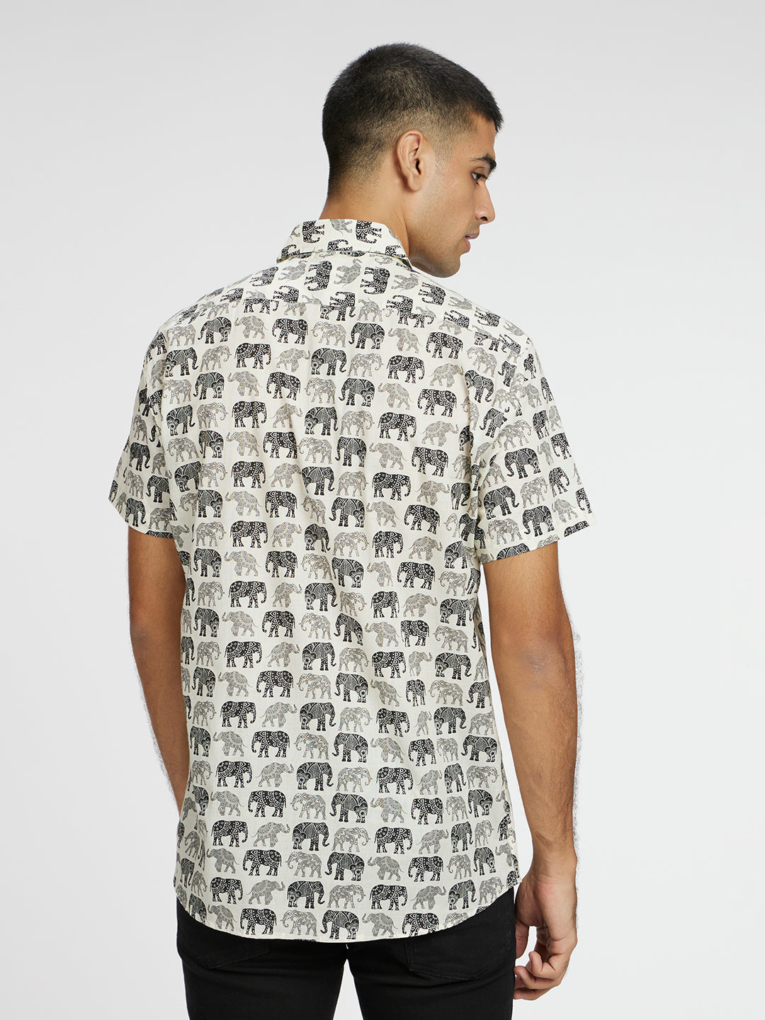 Model facing backwards wearing Black and white Elephant graphic Printed Halfsleeves Cotton Shirt by Brand Patrah