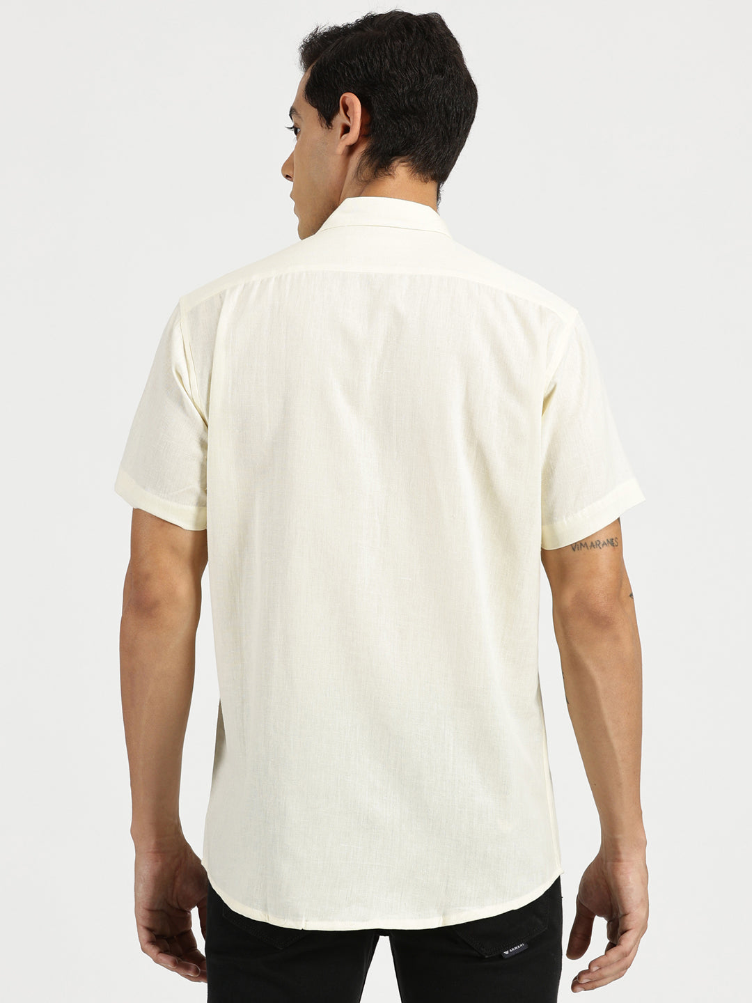 Model facing backwards wearing Off-white Slub Soft Cotton Halfsleeves Shirt by Brand Patrah
