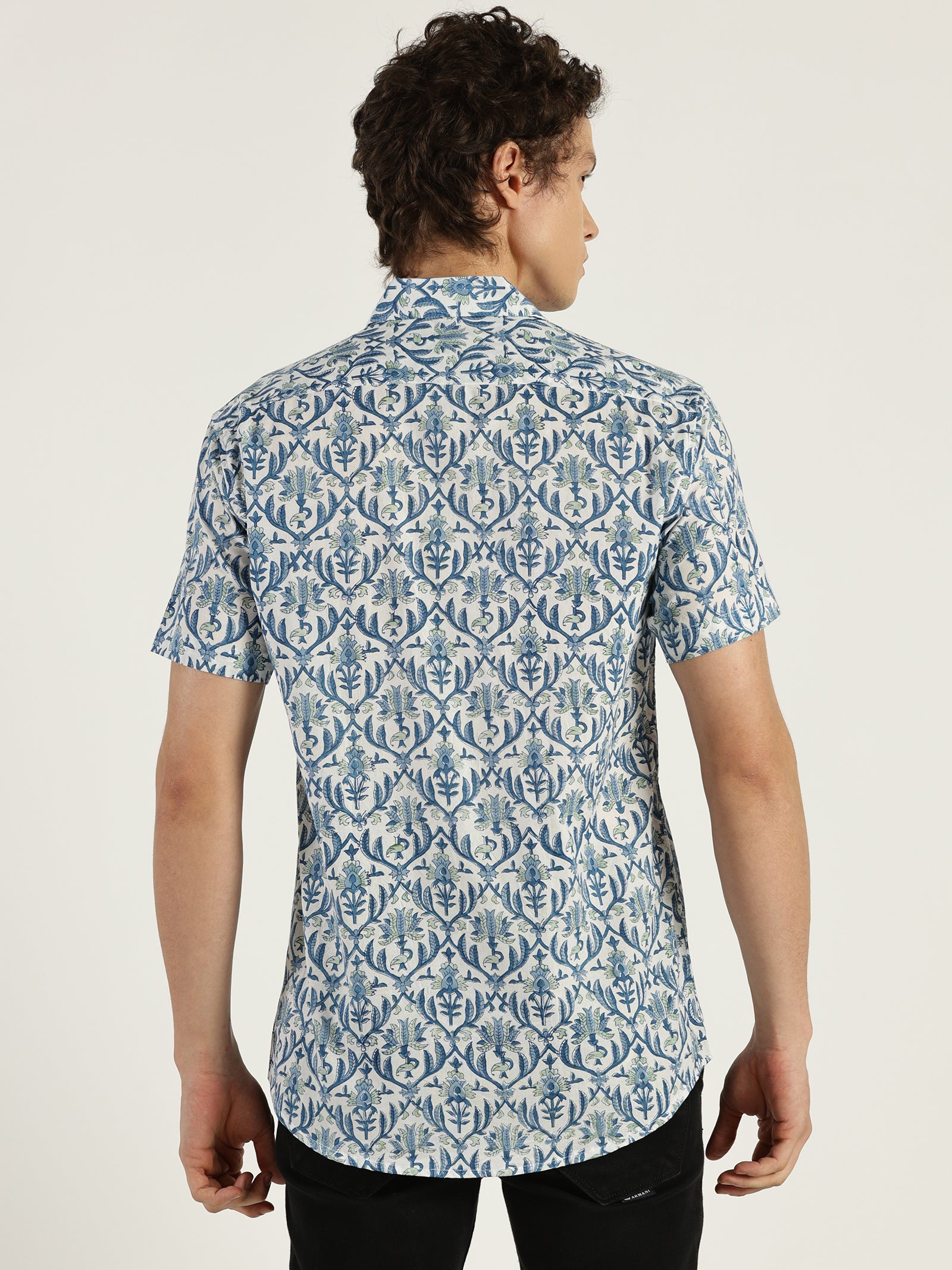 Model facing backwards wearing Blue Pottery Block Printed Halfsleeves Cotton Shirt by Brand Patrah