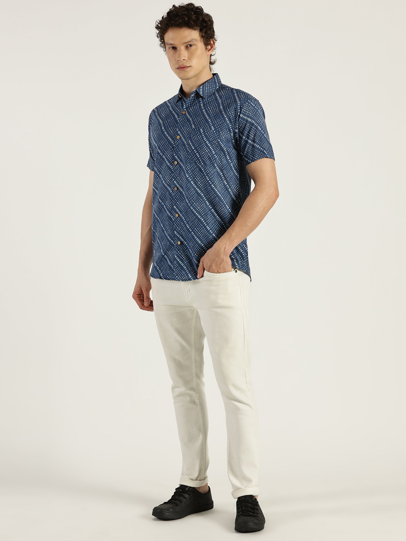 White Model wearing Blue Abstract Chex Printed Halfsleeves Cotton Shirt by Brand Patrah