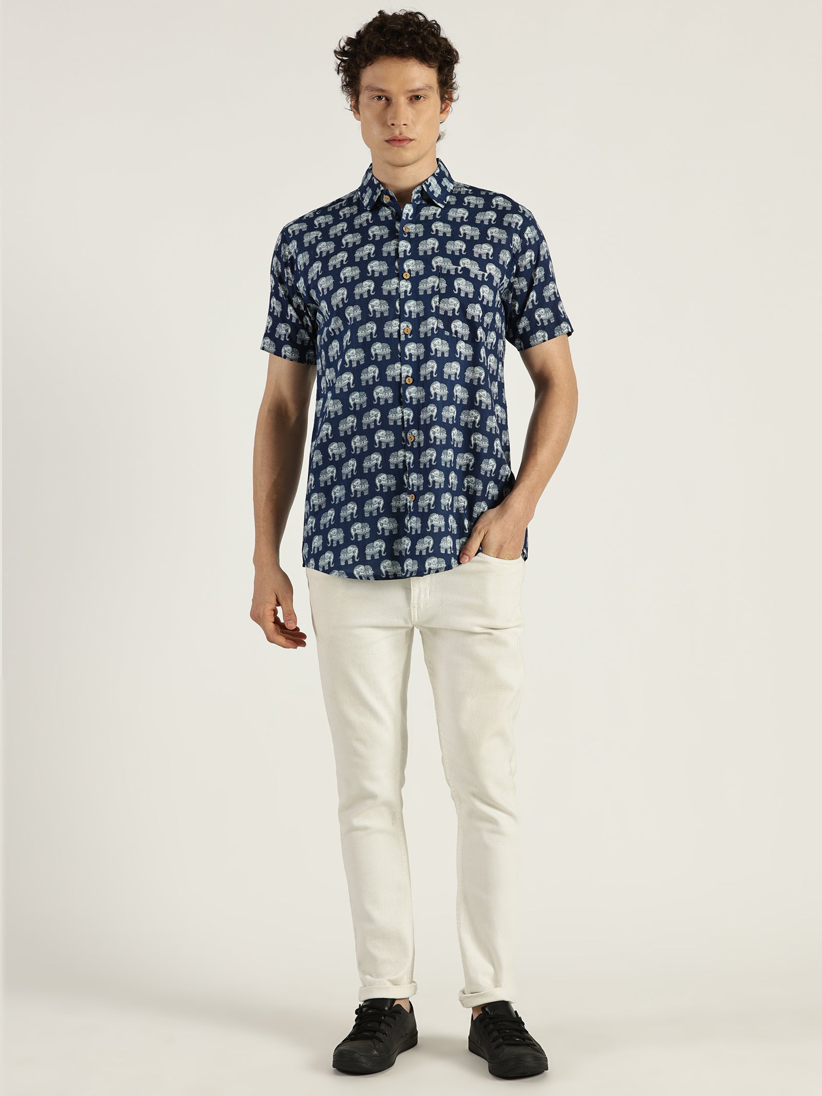 White Model wearing Indigo Ethnic Elephant Printed Halfsleeves Cotton Shirt by Brand Patrah