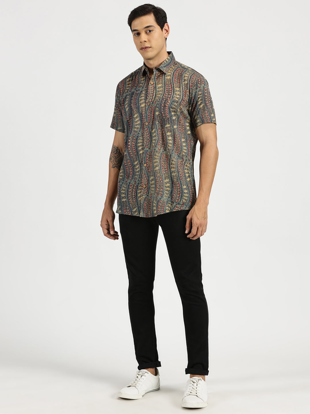 White Model wearing Emerald Nomad Block Printed Halfsleeves Mulmul Cotton Shirt by Brand Patrah