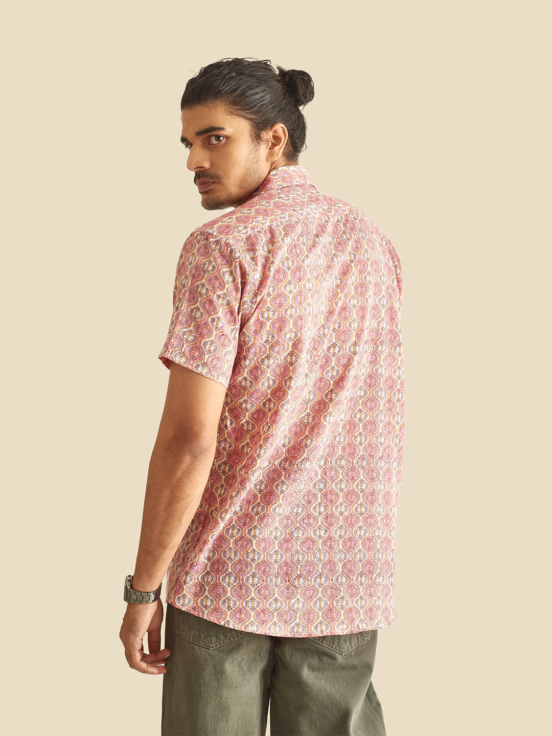 Model facing backwards wearing Pink and White Ethnic Block Printed Holiday Halfsleeves Cotton Shirt by Brand Patrah