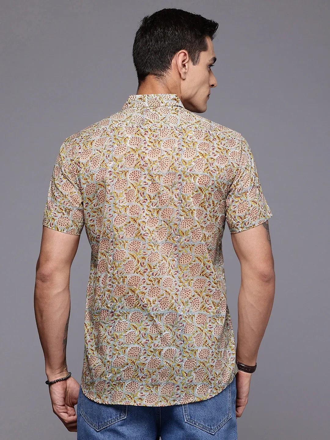 Back view of vintage floral print cotton shirt worn for summer comfort