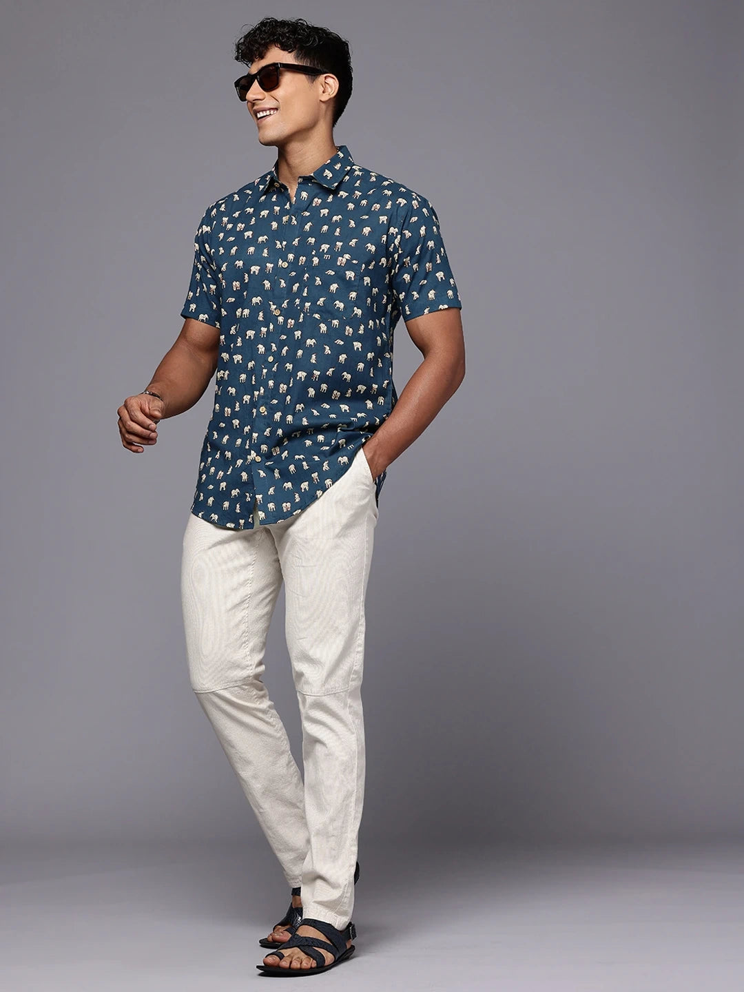 Full length view of man wearing elephant cotton shirt for travel style