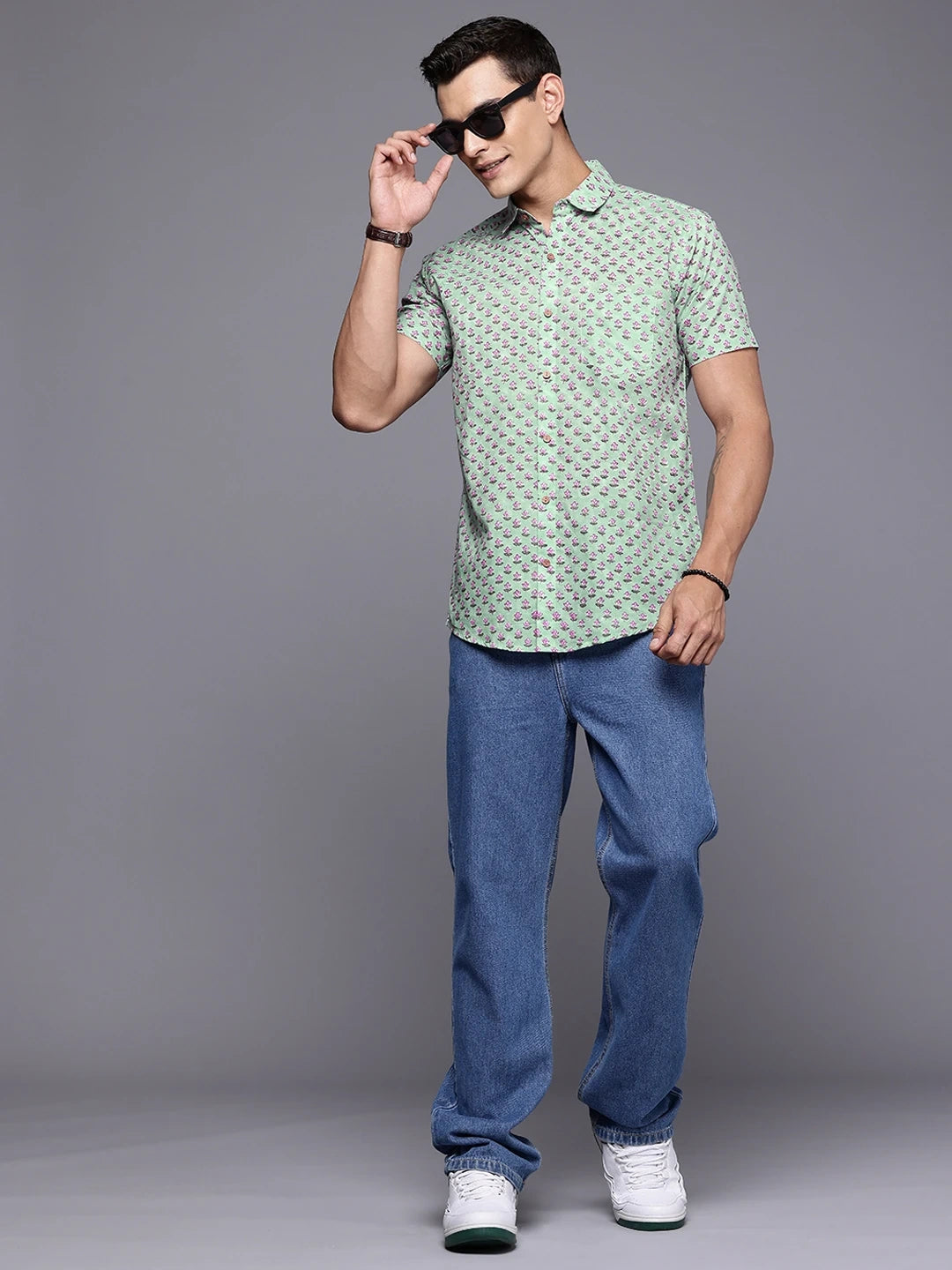 Full length view of sage green floral shirt styled for Sunday wear