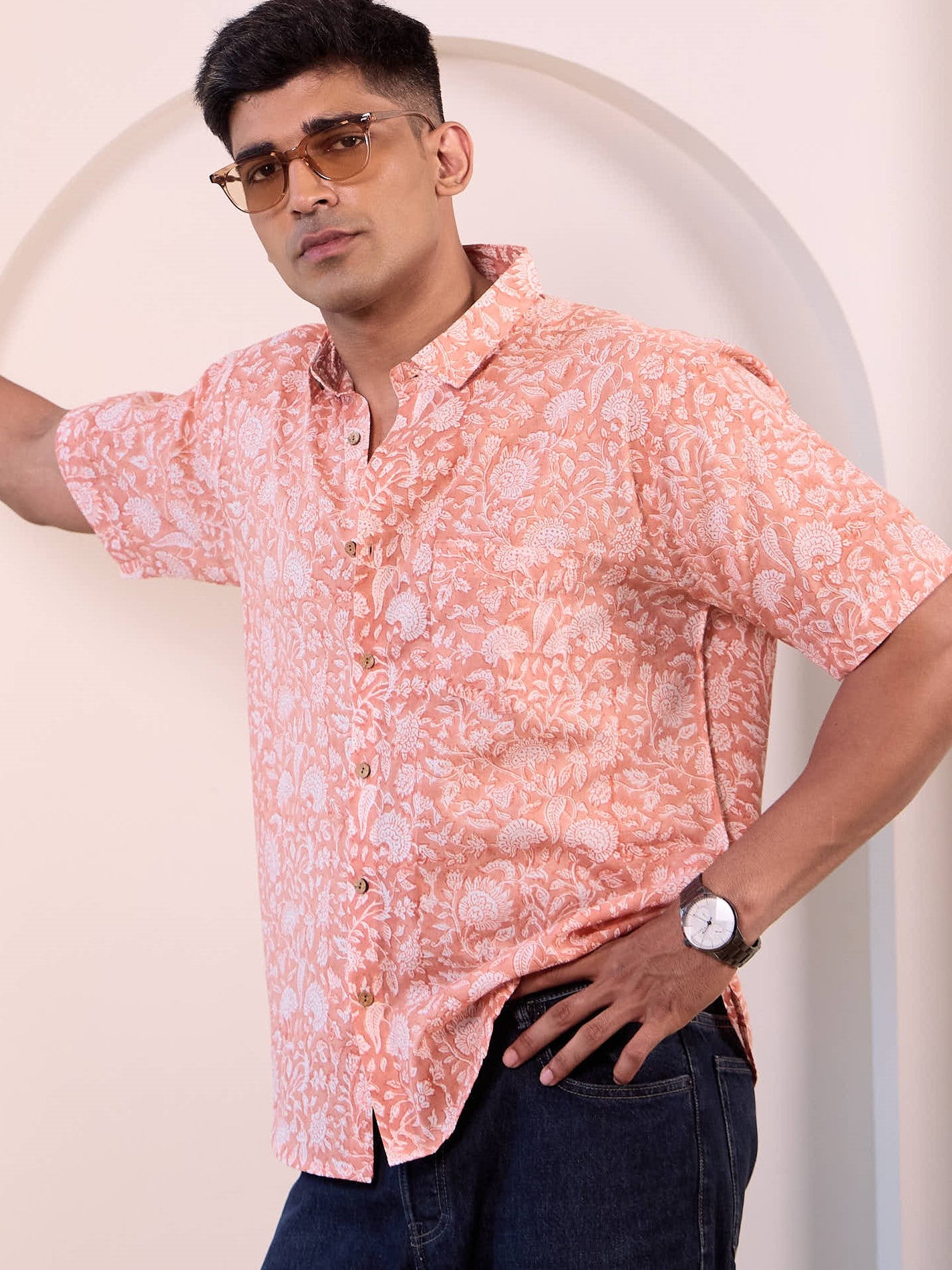 Model wearing a amber colour mulmul, short sleeves casual shirt made of pure cotton fabric