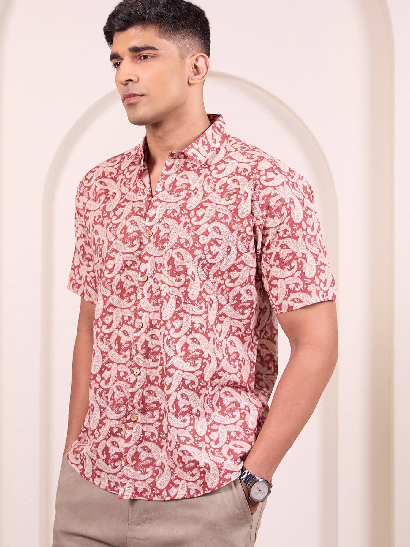 Model wearing a maroon colour ethnic, short sleeves casual shirt made of pure cotton fabric