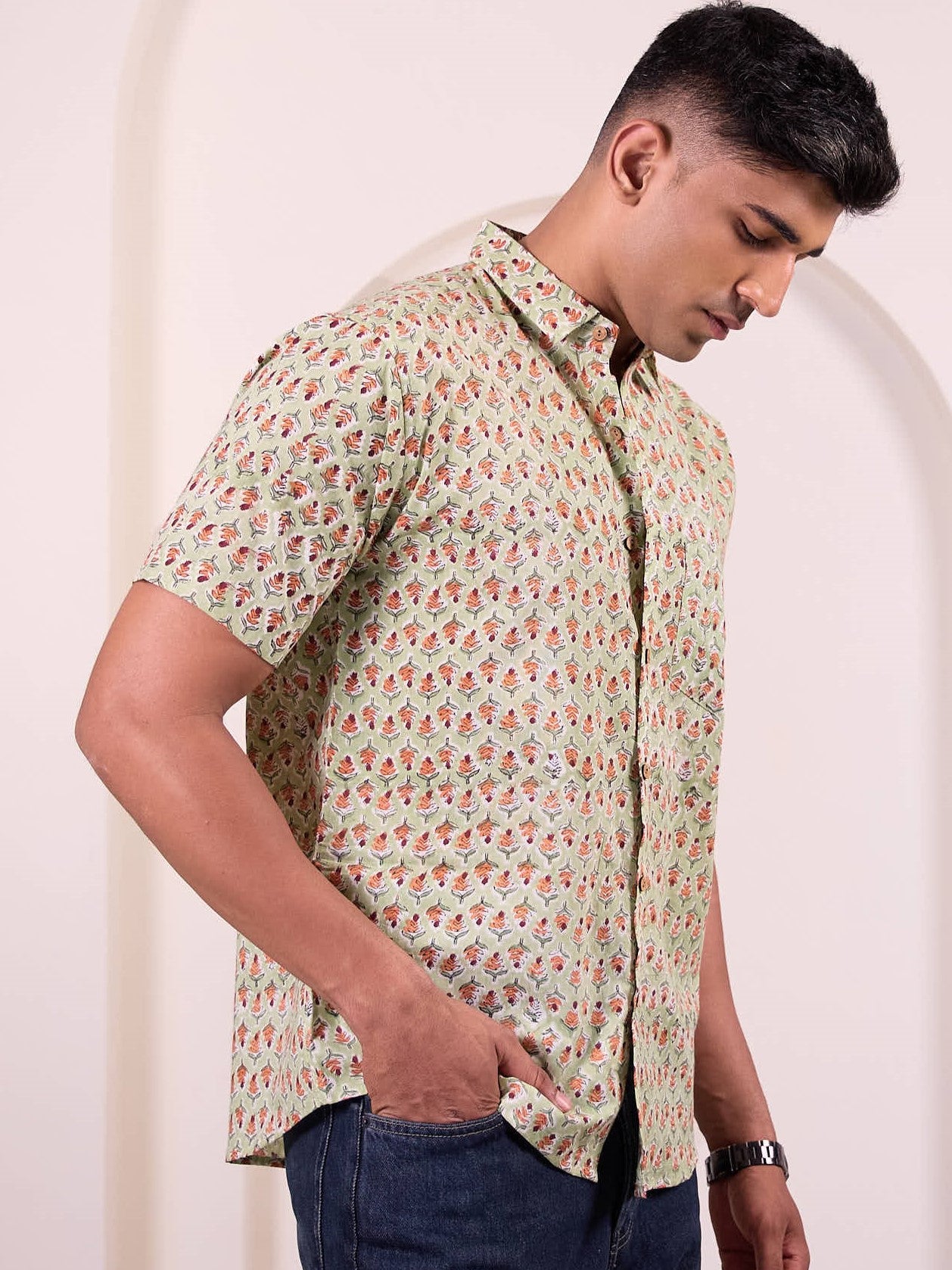 Model wearing a green colour ethnic, short sleeves casual shirt made of pure cotton fabric