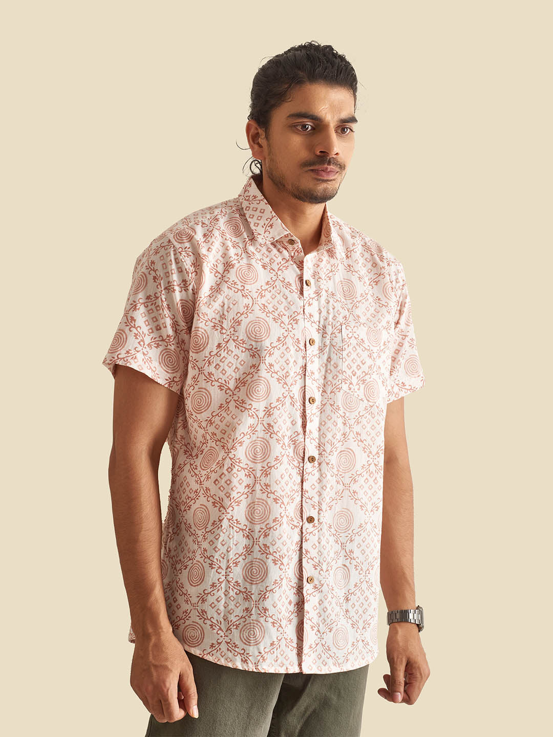 Model Facing sideways wearing White Ethnic Block Printed Holiday Halfsleeves Cotton Shirt by Brand Patrah