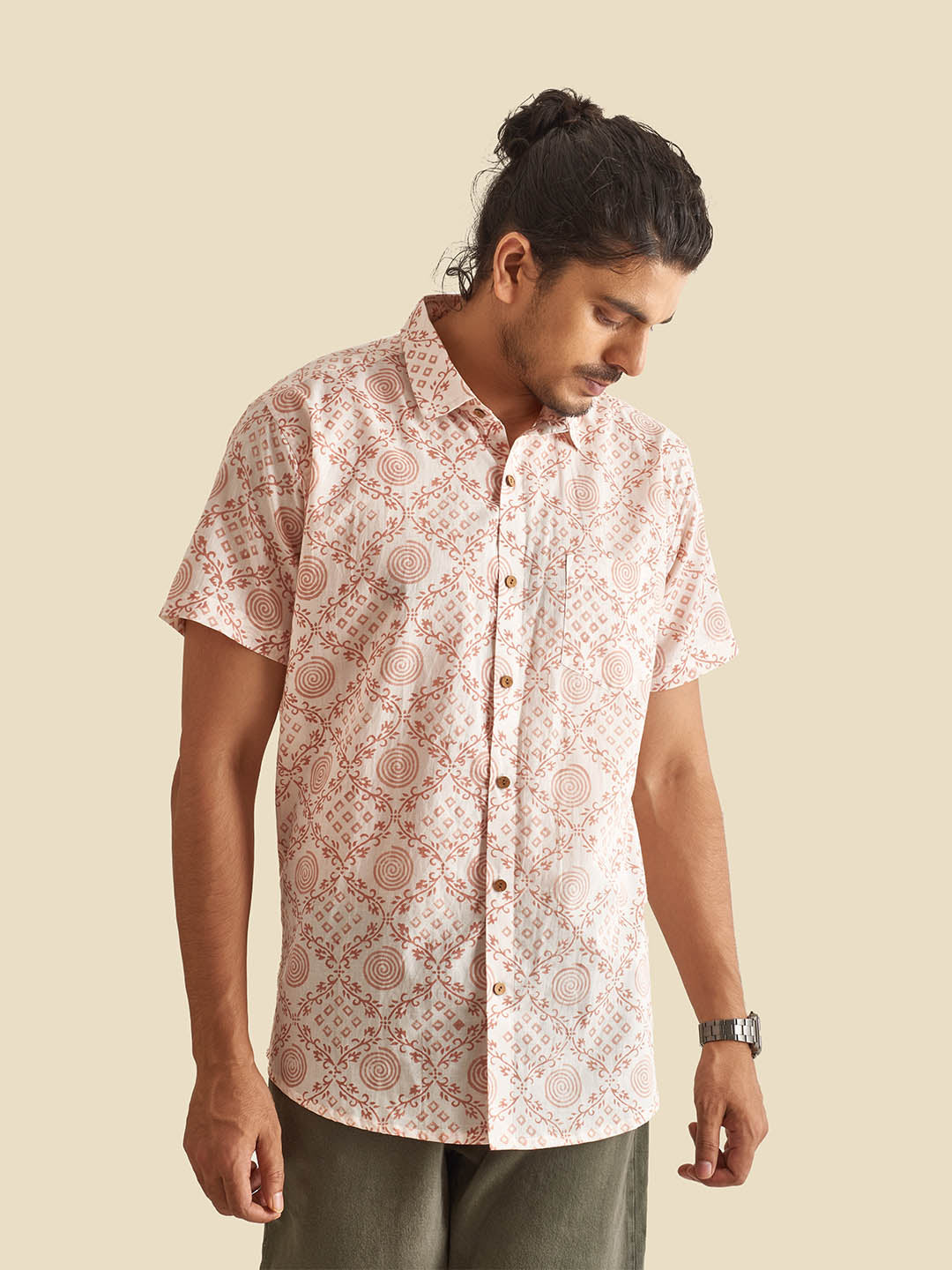 Model Facing sideways wearing White Ethnic Block Printed Holiday Halfsleeves Cotton Shirt by Brand Patrah