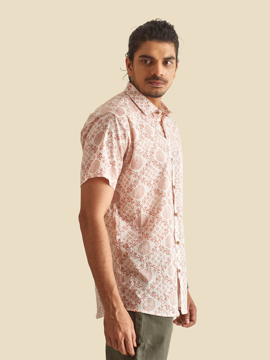 Model Facing sideways wearing White Ethnic Block Printed Holiday Halfsleeves Cotton Shirt by Brand Patrah