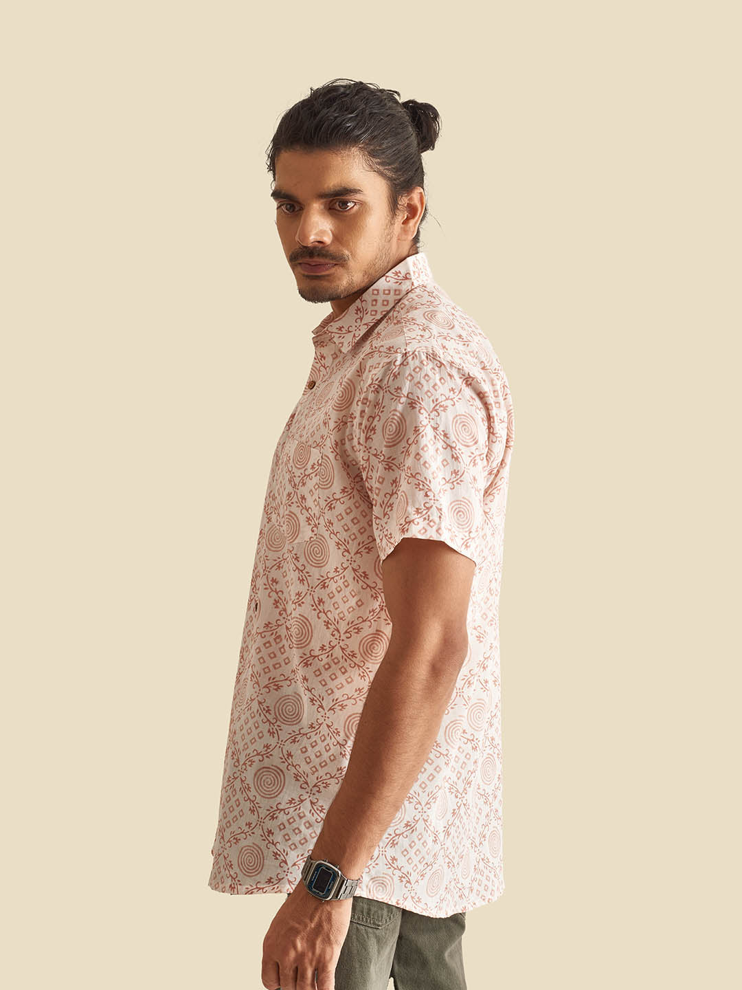 Model Facing sideways wearing White Ethnic Block Printed Holiday Halfsleeves Cotton Shirt by Brand Patrah