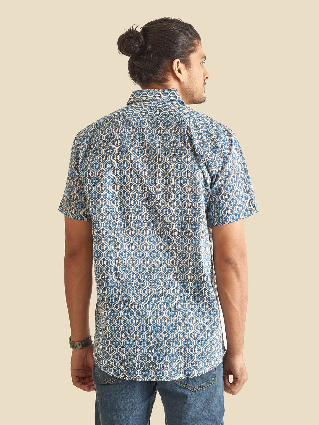 Model facing backwards wearing Blue and White Ethnic Block Printed Holiday Halfsleeves Cotton Shirt by Brand Patrah