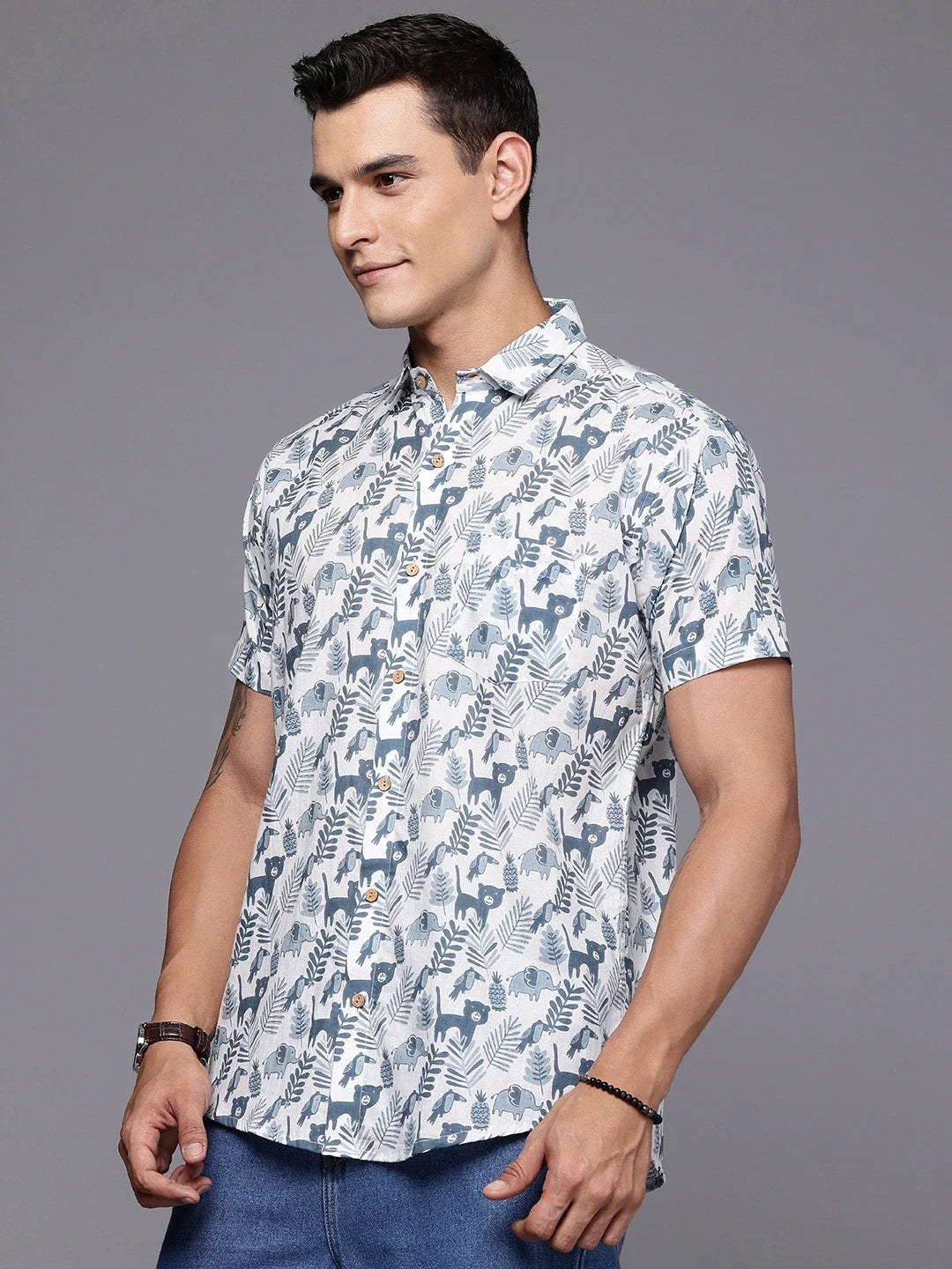 Side profile of man in earthy safari print cotton shirt