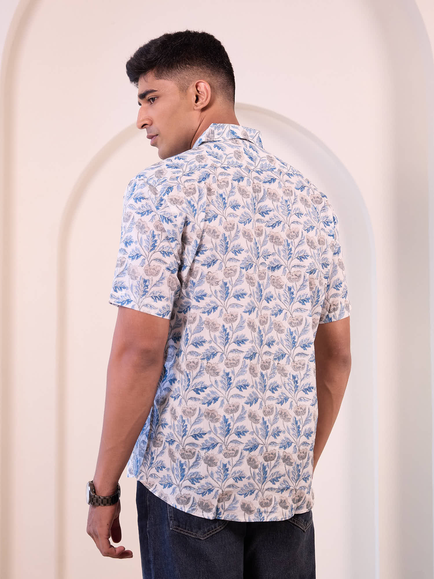 Model wearing printed short sleeve casual shirt back design