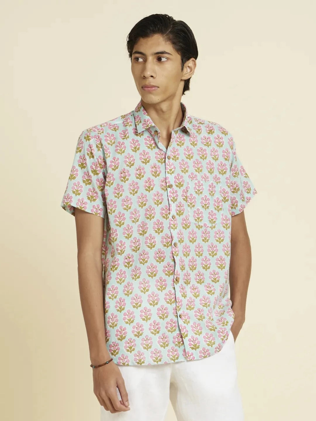 Model Facing sideways wearing Block Printed Quirky Unisex Shirt by Brand Patrah