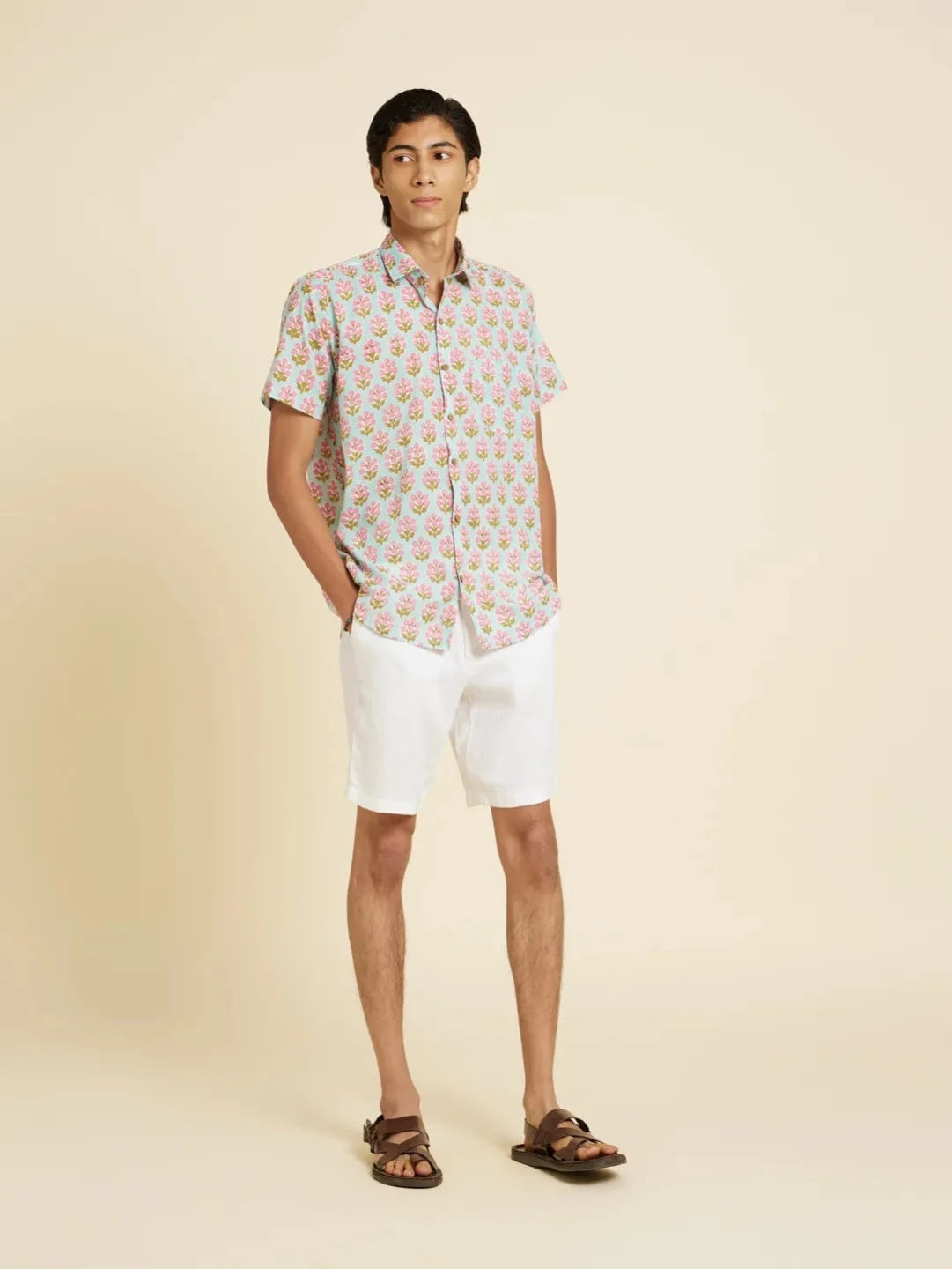 Model Facing sideways wearing Block Printed Quirky Unisex Shirt by Brand Patrah