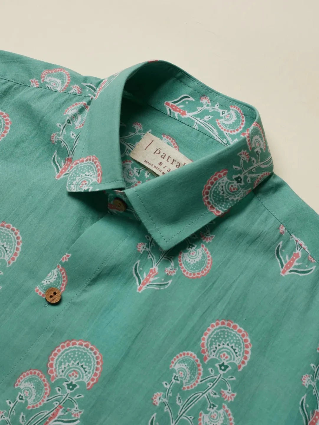 Close up of Teal Botanical Flower Printed Shirt by Brand Patrah