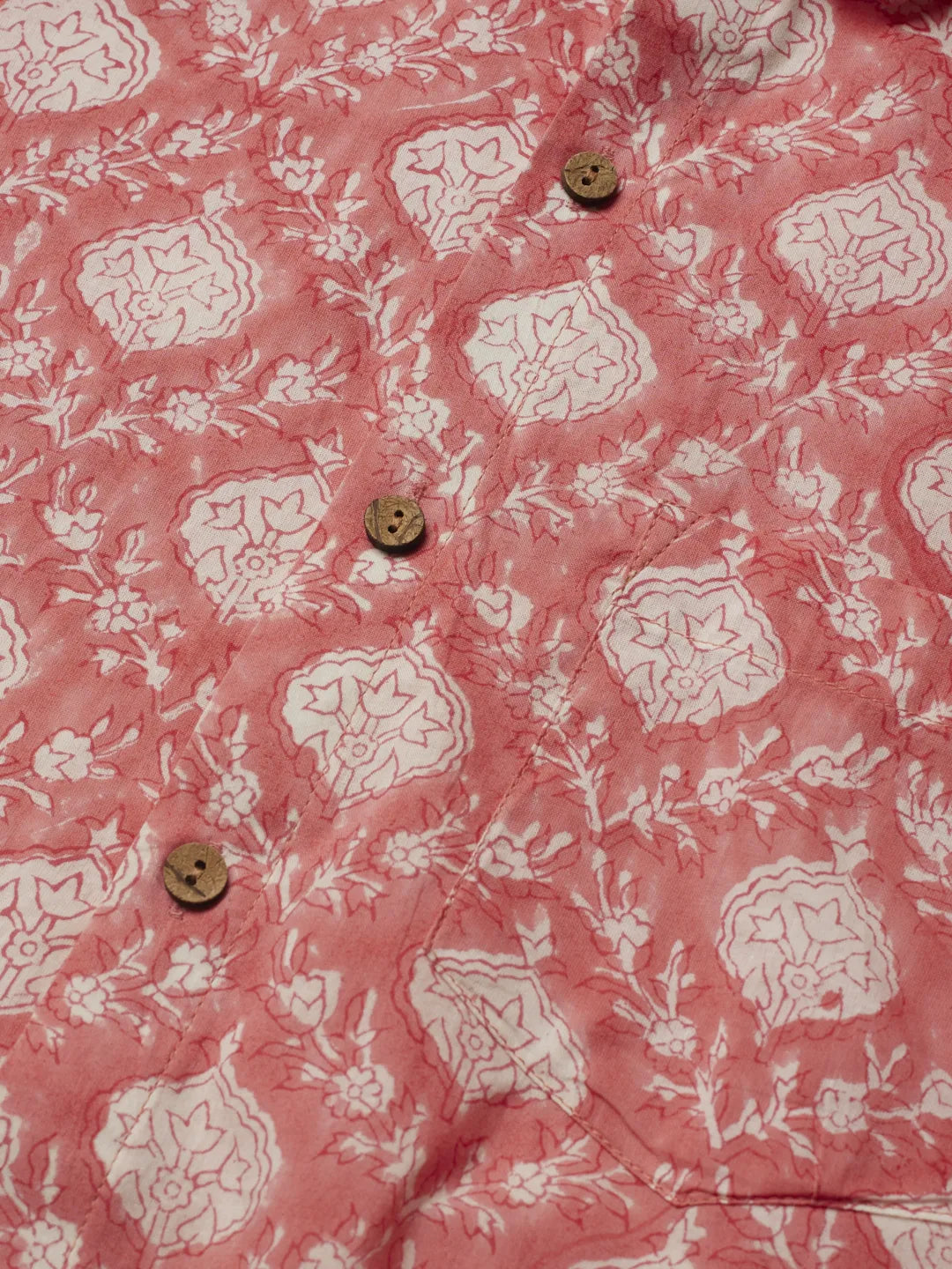 Close up of Summer Coral Handblock Printed earing Shirt by Brand Patrah