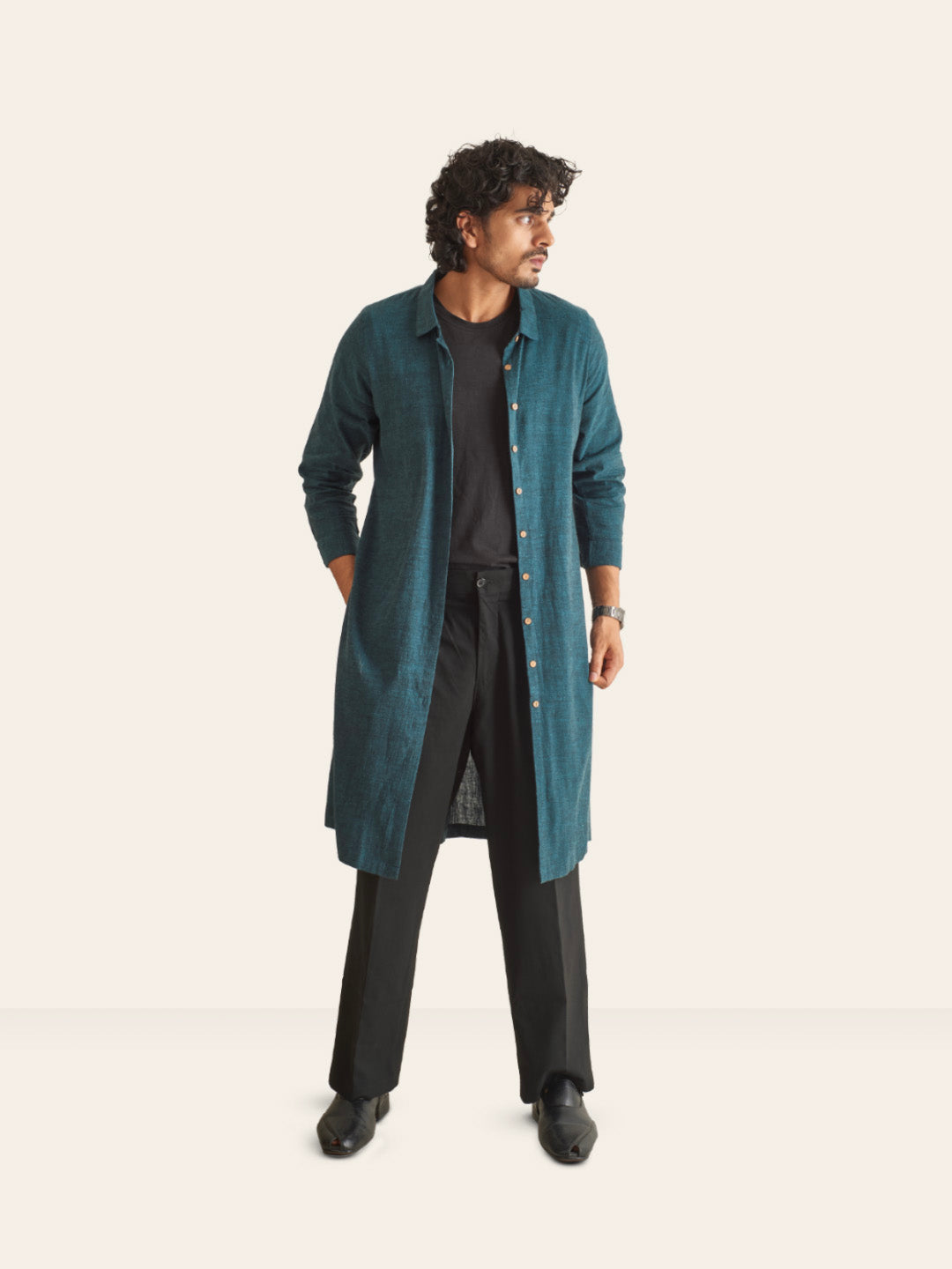 Model Facing sideways wearing Dark Pine Handwoven Overlay Kurta Shirt by Brand Patrah