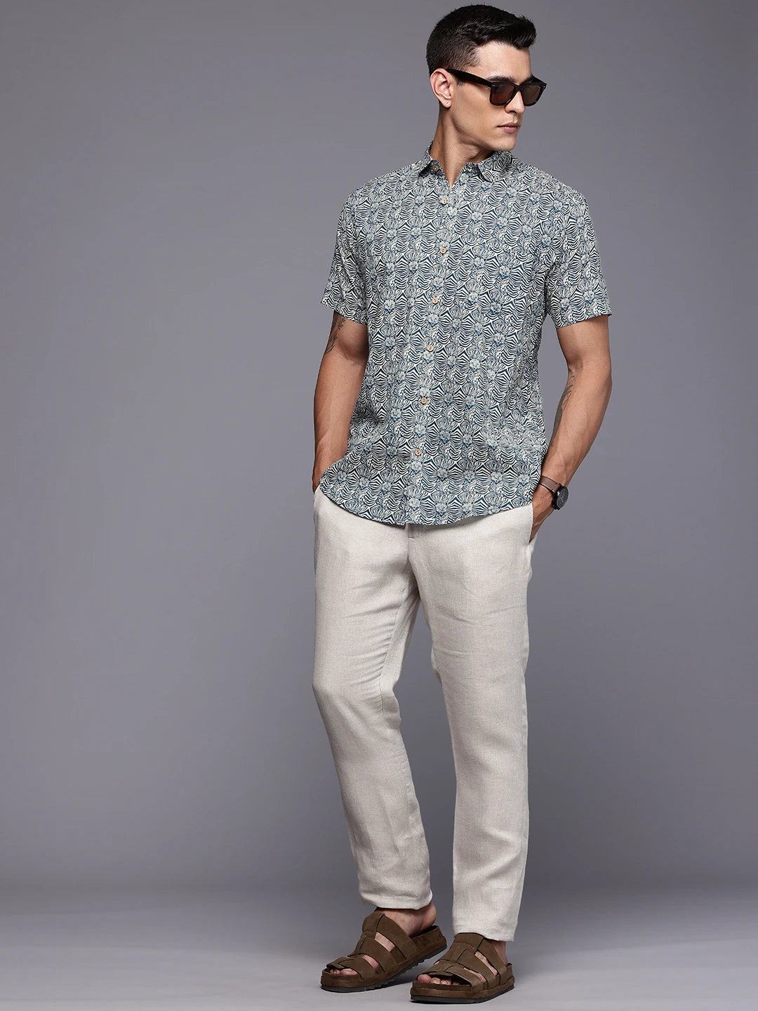 Man wearing a printed short sleeves shirt