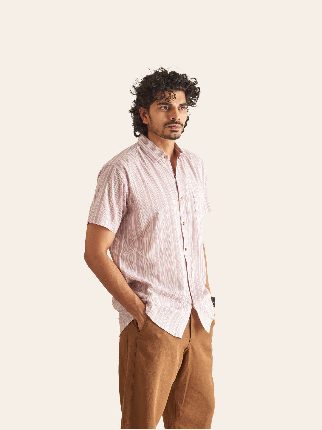Model Facing sideways wearing White and Plum Line Cotton Shirt by Brand Patrah