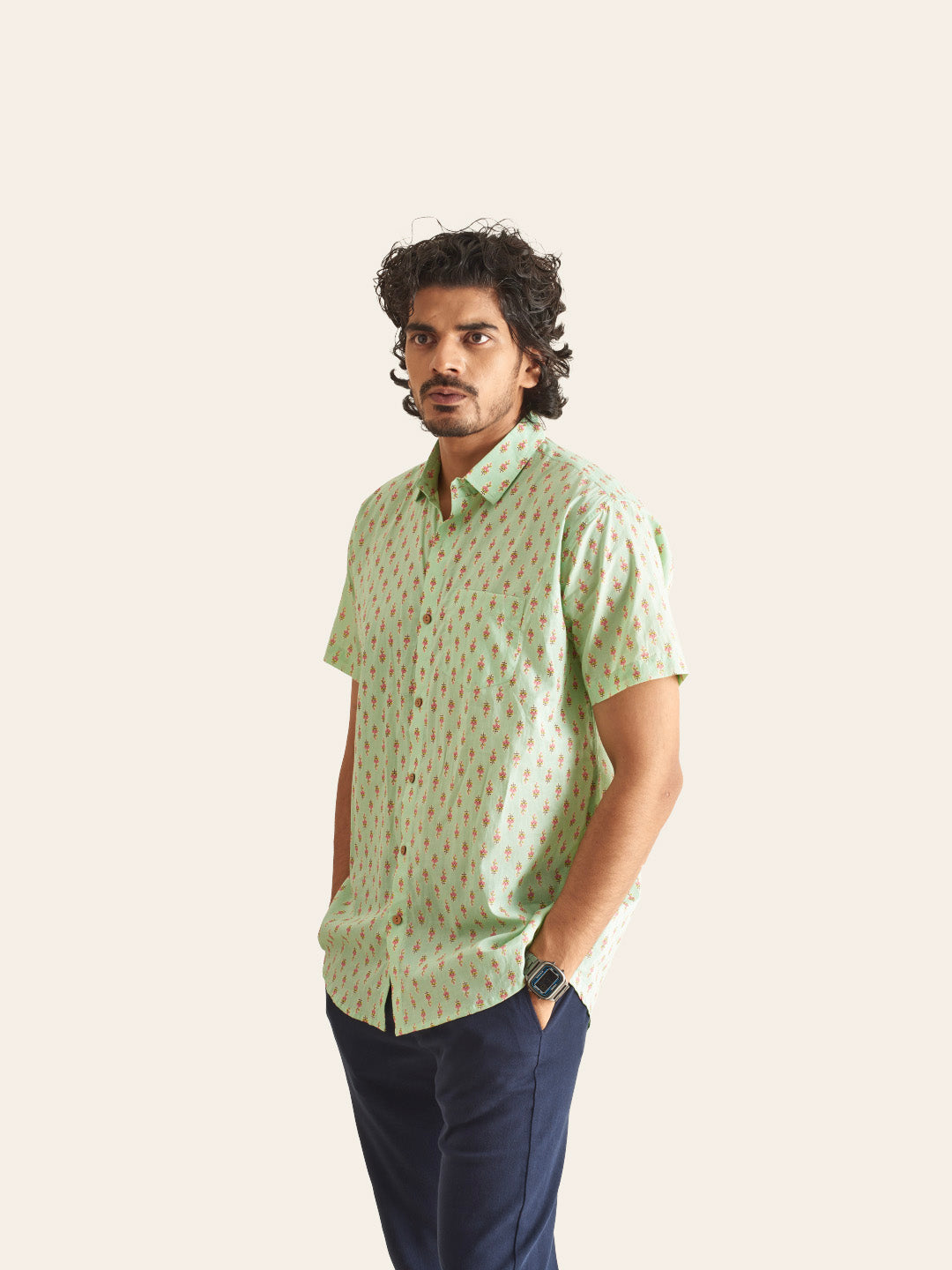 Model Facing sideways wearing Mint Green Printed Cotton Shirt by Brand Patrah