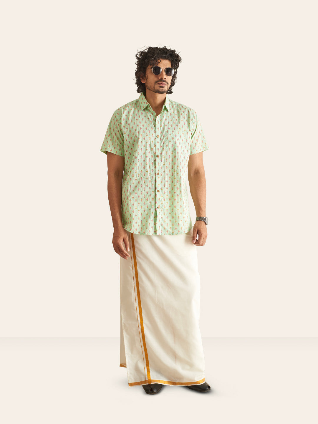 Model Facing sideways wearing Mint Green Printed Cotton Shirt by Brand Patrah