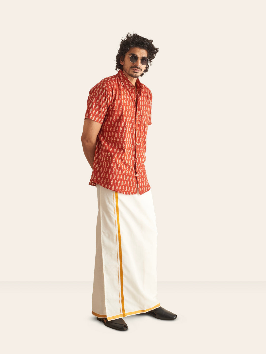 Brown Model wearing Natural Dye Red Ethnic Motif Handblock Printed Cotton Shirt by Brand Patrah