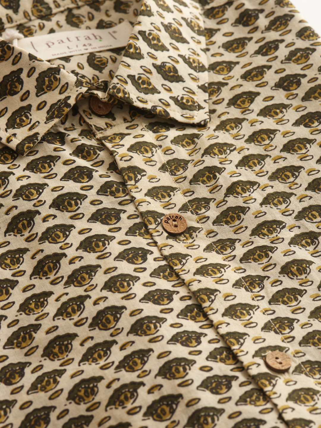 Close up of Mustard Motif Ivory Handblock Printed Cotton Shirt by Brand Patrah