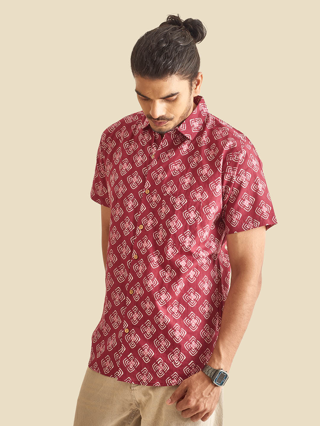 Brown Model wearing Plum Abstract Chula Printed Halfsleeves Cotton Shirt by Brand Patrah