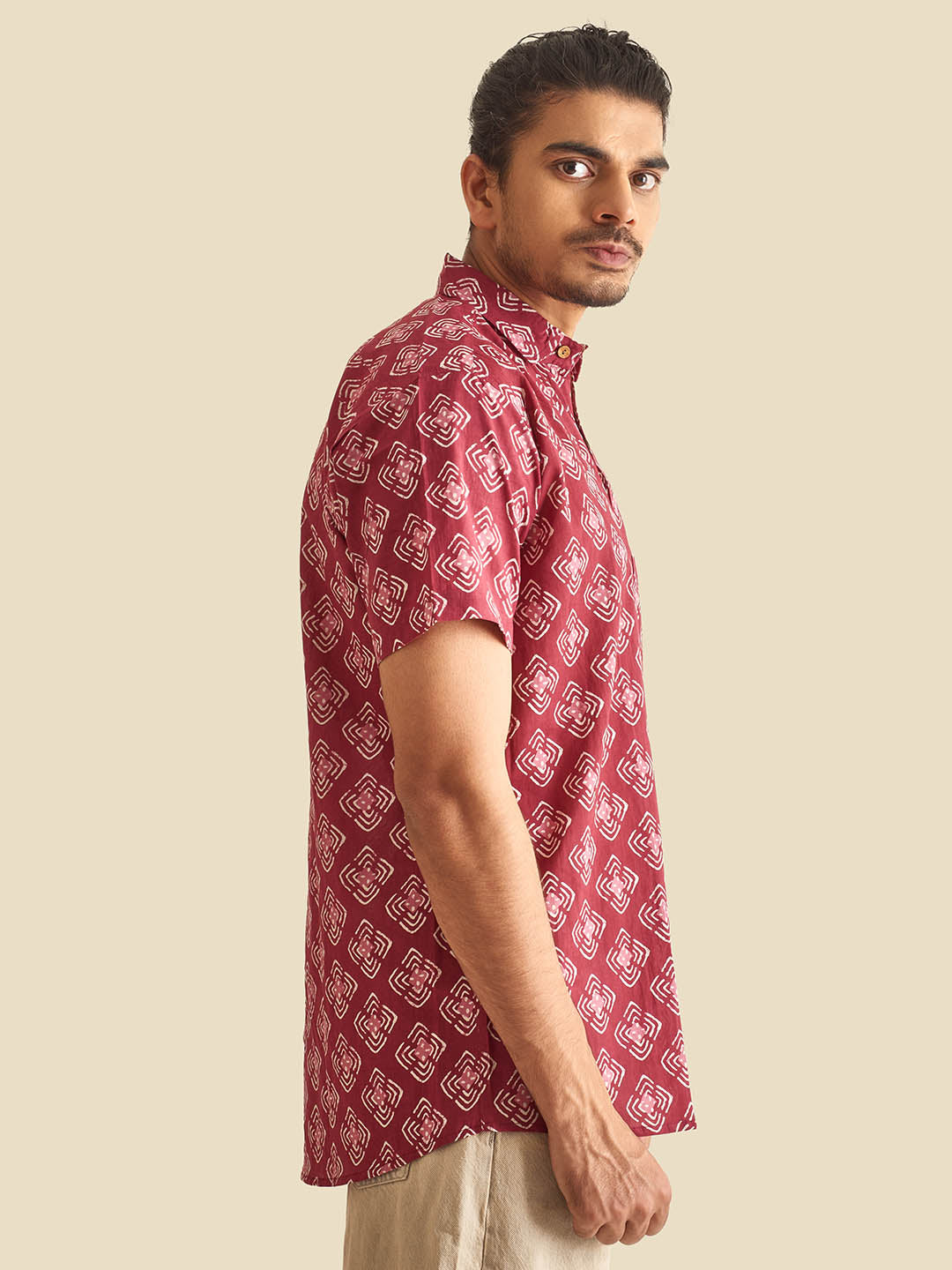 Brown Model wearing Plum Abstract Chula Printed Halfsleeves Cotton Shirt by Brand Patrah