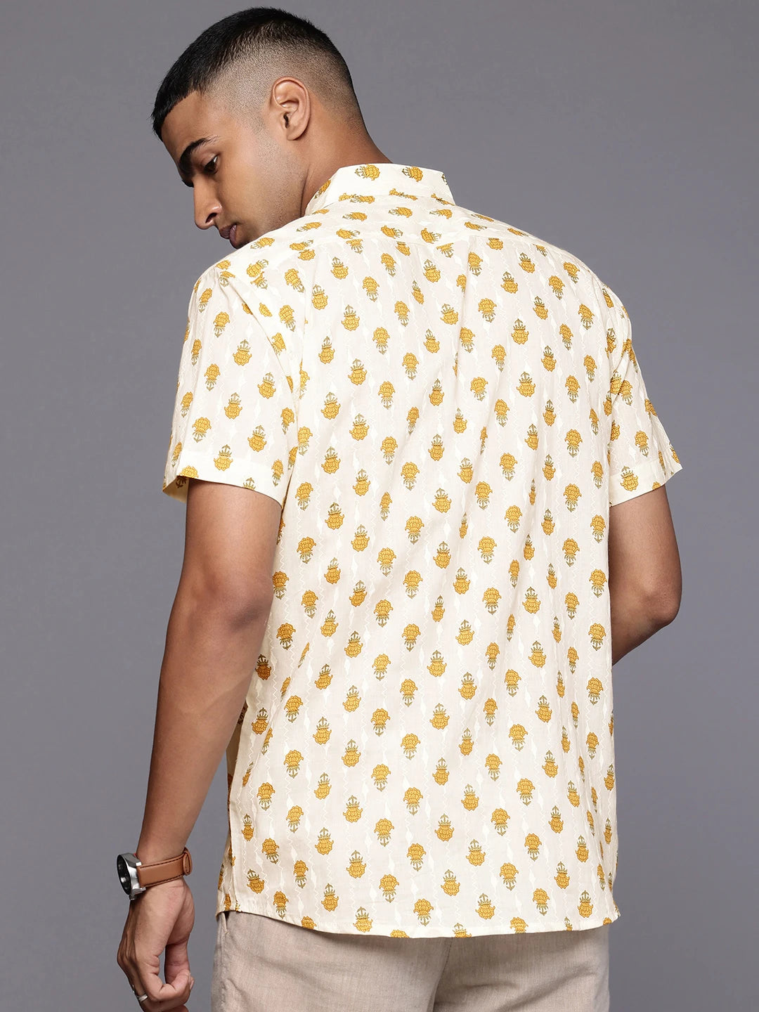 Model facing backwards wearing Floral Print Cotton Shirt by Brand Patrah