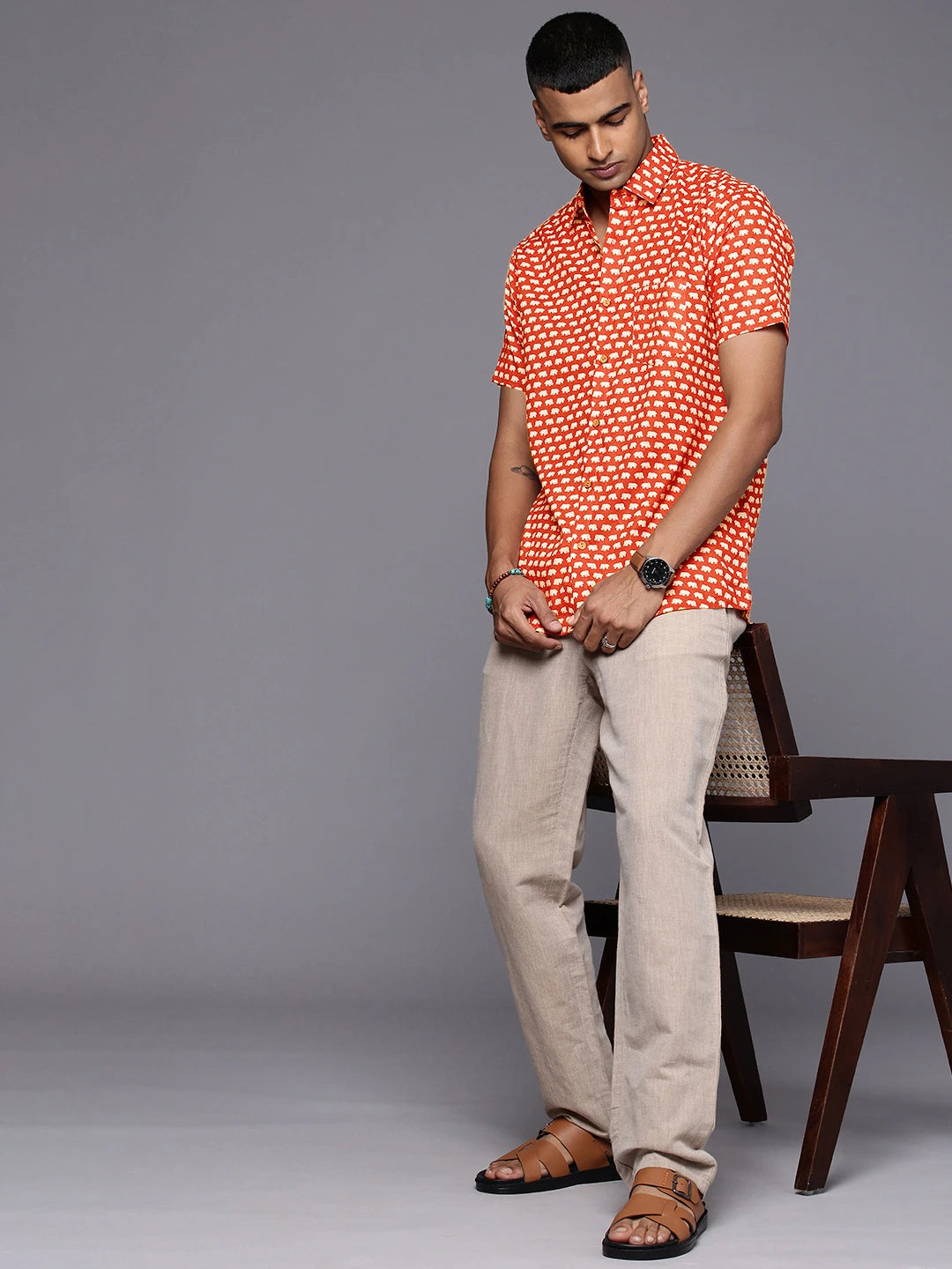 Brown Model wearing Red Elephant Print Shirt by Brand Patrah