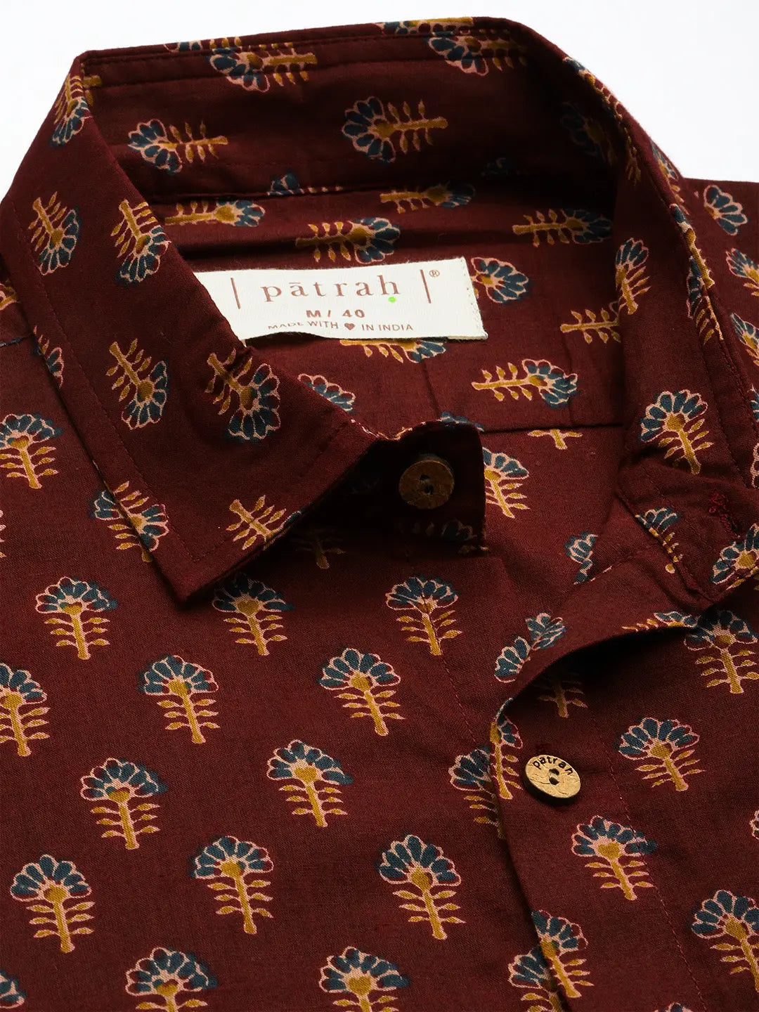 Close up of Maroon Floral Print Shirt by Brand Patrah