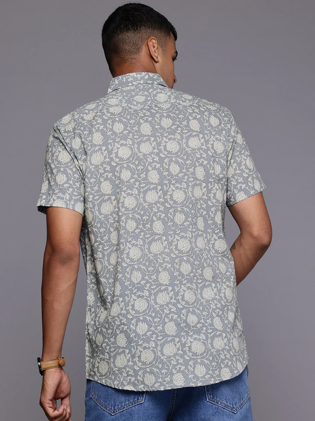 Model facing backwards wearing Floral Print Grey Shirt by Brand Patrah